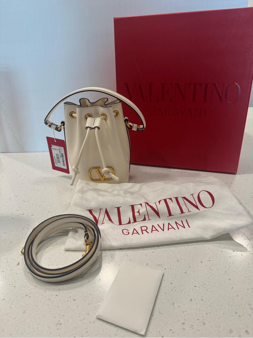 NWT & BOX Valentino Garavani Cream Leather VLogo Mini Drawstring Bag - Picture 13 of 15